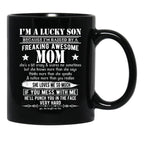 I'M A Lucky Son Because I'M Raised By A Freaking Awesome Mom (5) Black Coffee Mug - Black
