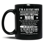 I'M A Lucky Son Because I'M Raised By A Freaking Awesome Mom (5) Black Coffee Mug