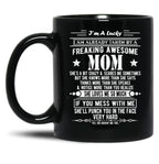 I'M A Lucky Son Because I'M Raised By A Freaking Awesome Mom Black Coffee Mug