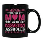 I'M Just A Mom Trying To Not Raise Assholes Black Coffee Mug - Black