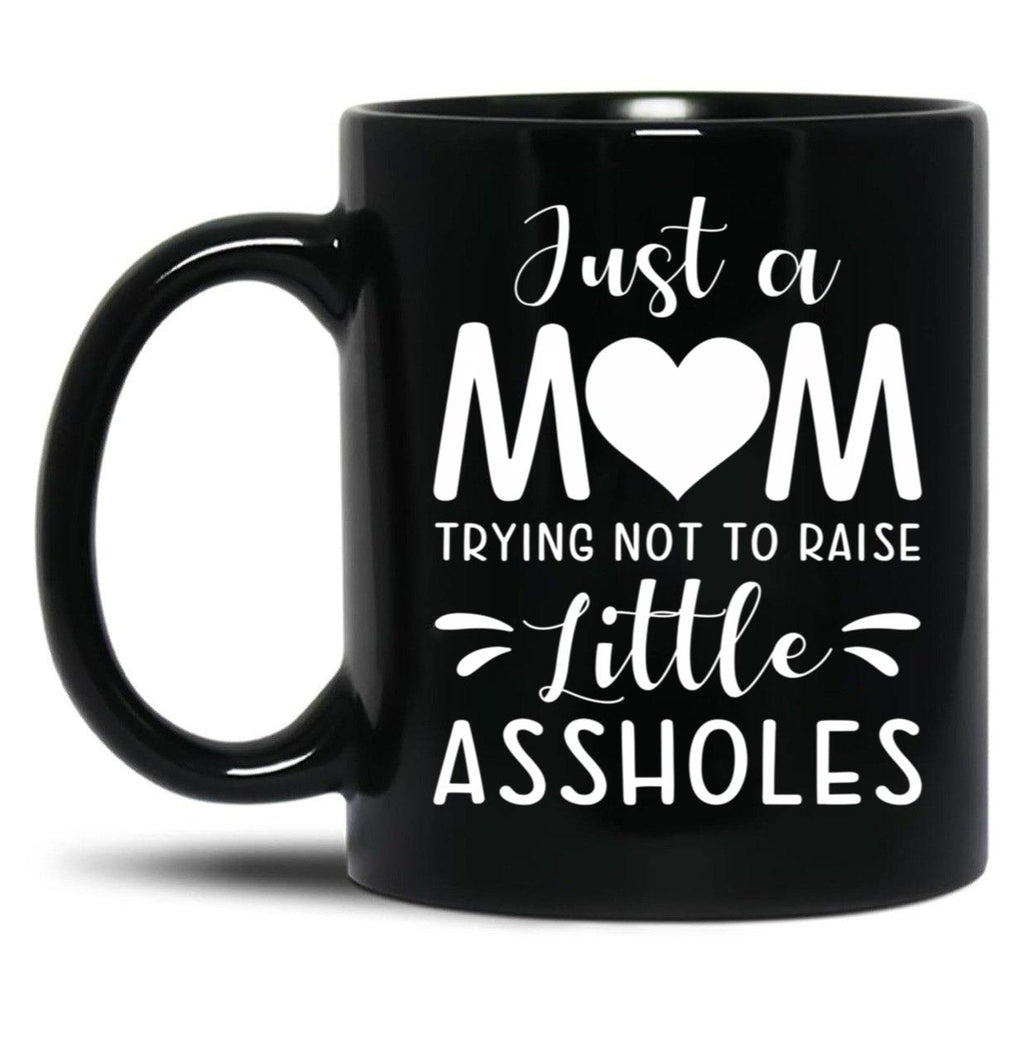 Just A Mom Trying Not To Raise Little Assholes Black Coffee Mug