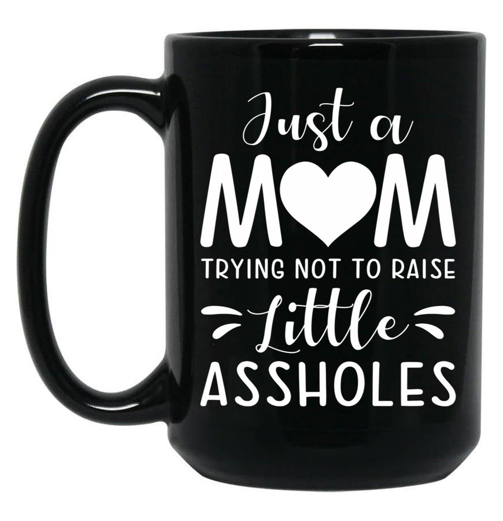 Just A Mom Trying Not To Raise Little Assholes Black Coffee Mug